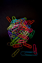 paper clips with black background