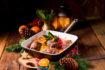 Wintry beef roulades with plum and bacon stuffing and cucumber
