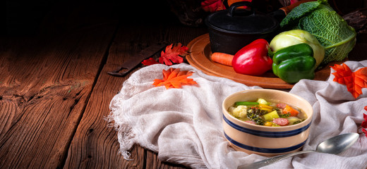 delicious autumnal vegetable soup with sausage and bacon