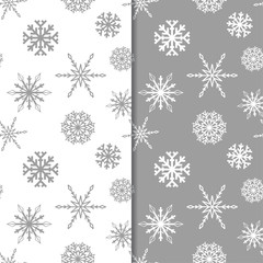 Snowflakes. Seamless patterns. Gray and white winter ornaments