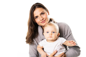 A mother holdng his baby on studio white background