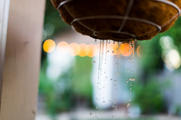 Water dripping out from a flower pot