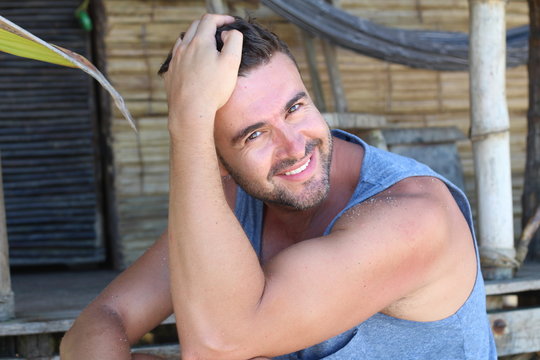 Handsome man smiling in summer look