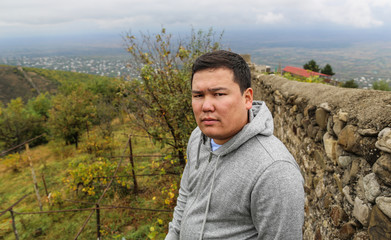 Naklejka na ściany i meble portrait of a kazakh outdoors