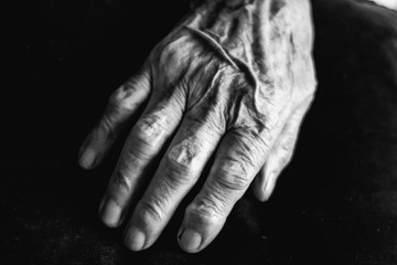 Obraz na płótnie Canvas old aged wrinkled hand