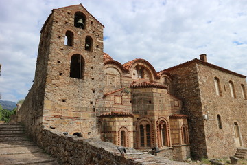 Ruins of bell tower and church of Saint Christopher in abandoned medieval city of Mystras, Peloponnese, Greece