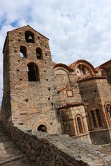 Ruins of bell tower and church of Saint Christopher in abandoned medieval city of Mystras, Peloponnese, Greece