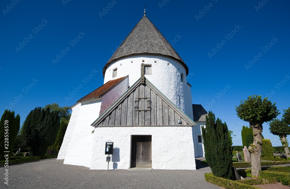 Wall mural defensive round church in olsker, bornholm, denmark. it is one of four round churches on the bornhol