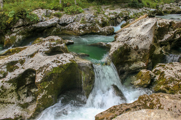 Beautiful Mostnica river surrounded with forest - national park Triglav in Slovenia.