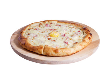 Carbonara pizza with sausage, ham, cheese and egg isolated on a white background.