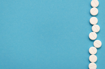 Blue background with tablets and copy space for your text or image