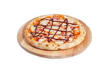 Pizza barbecue with ham, bacon and cheese lies on a round wooden board isolated on a white background.