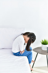 Family concept. Little girl is being annoyed by an adult. Little girl is demanding attention. Asian...