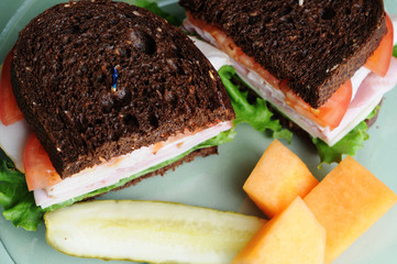 Black Forest Deli Sandwich with Fruit and Pickle