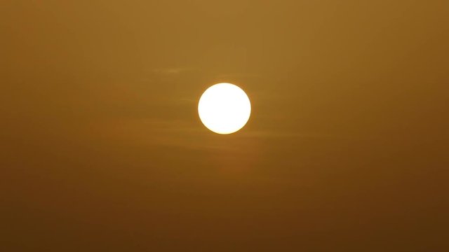view of the sun in a misty weather,

