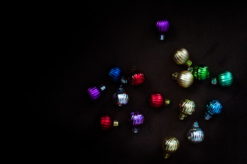 Color christmas balls on dark background