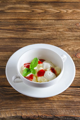 Healthe breakfast - lazy dumplings with sour cream and strawberry jam