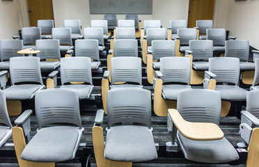 Adjustable desk seats in lecture hall or classroom, university, college, library, office, hospital