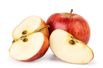 Red Apple, half and piece on a white background.