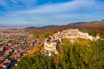Obraz premium Landscape with Rasnov town and medieval fortress, Brasov, Transylvania, Romania
