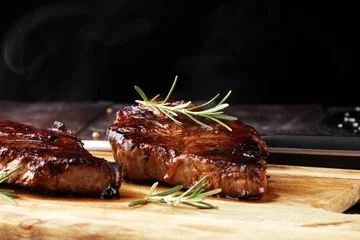 Photo sur Plexiglas Steakhouse Barbecue Rib Eye Steak or rump steak - Dry Aged Wagyu Entrecote Steak