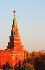 Borovitskaya or Predtechenskaya tower, Moscow Kremlin. Autumn, sunset. Gate of the tower is used by the motorcade of the president of Russia