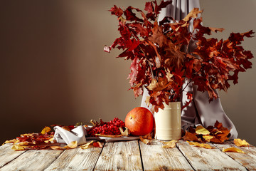 Autumnal table with free space for an advertising product  