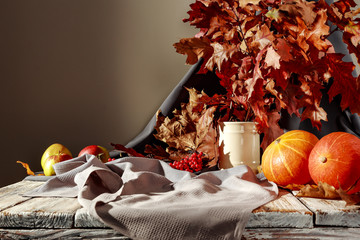 Autumnal table with free space for an advertising product  