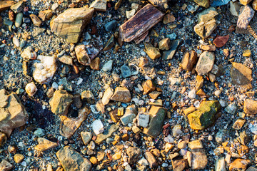 Sea pebbles. Small stones gravel texture background.Pile of pebbles, thailand.Color stone in background.