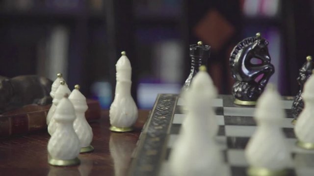 Chess board with chessmans in unfinished game close up (dolly, 1080p)