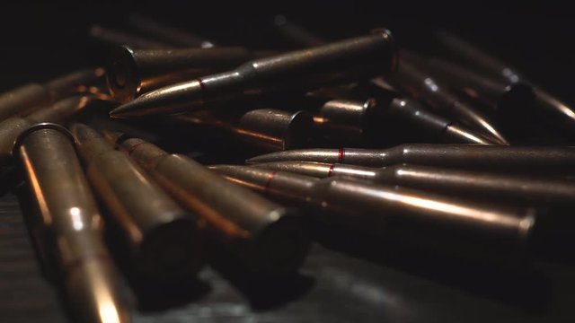 Close-up of cartridges from the machine gun. 4k