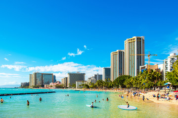 Fototapeta na wymiar HONOLULU, HAWAII - FEBRUARY 16, 2018: View of the Waikiki beach. Copy space for text.