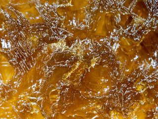 Cola ice crystal turns a beautiful brown background