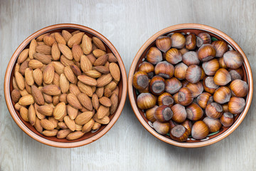 Hazelnut and almond in bowls