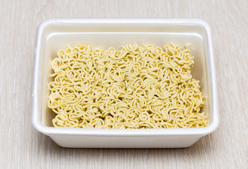 Raw food noodles on the table