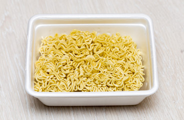 Raw food noodles on the table