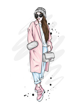 Beautiful, tall and slender girl in a stylish coat, trousers, and glasses. Stylish woman in high-heeled shoes. Fashion & Style. Vector illustration.