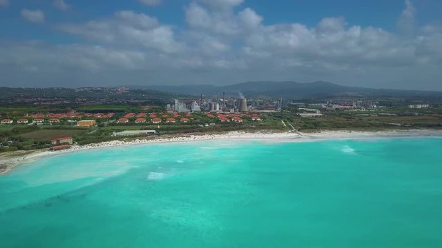 Aerial shot, incredibly beautiful calm sea with lots of clouds, white beach created because of huge water pollution with very calm sea, filmed with drone