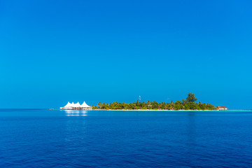 View of the seascape and the hotel above the water, Maldives. Copy space for text.