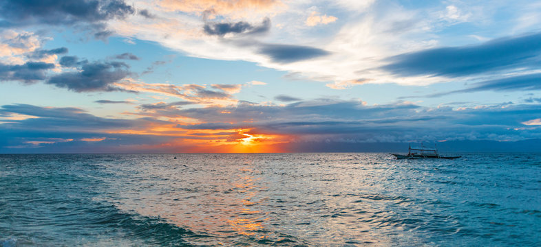 Sunset view of the sea in Moalboal, Cebu, Philippines. Copy space for text.