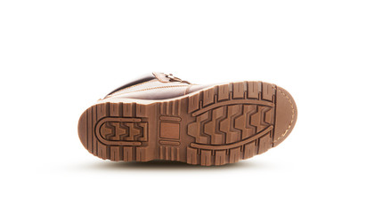 Brown boots sole. Isolated on a white