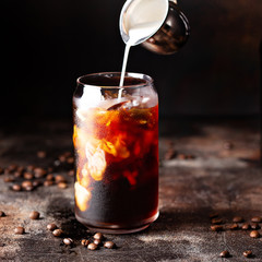 Cold brew iced coffee in glass bottles - obrazy, fototapety, plakaty
