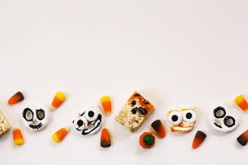 Halloween candy decorations isolated on white