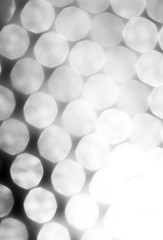 Black and White defocused bokeh lights. abstract background