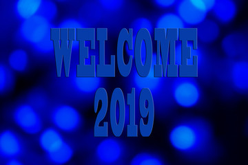 2019 NEW YEAR CONCEPT WITH TEXT WELCOME 2019 OVER BLURRED BACKGROUND