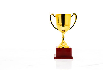 Golden trophy cup isolated on white background.