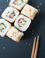 Rolls on black stone background.
