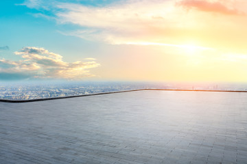Panoramic skyline and buildings with empty concrete square floor