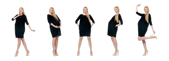 Pretty pregnant woman in mini black dress isolated on white