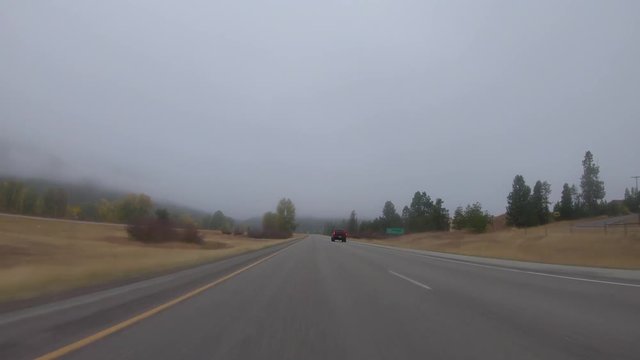 Early fall morning drive through the Bitterroot Mountains in Montana